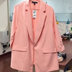 Jacket without lining color peach
Bust 43” length 27 sleeves 18”